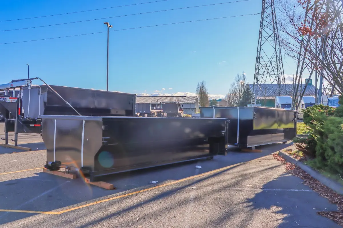Roll-off dumpster ready for waste disposal at job site for 15 Yard Dumpster Rental in East Caln
